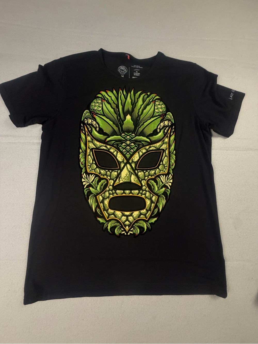 Ay Guey Men's Black Short Sleeve Tee with Green Ornamental Mask Graphic M